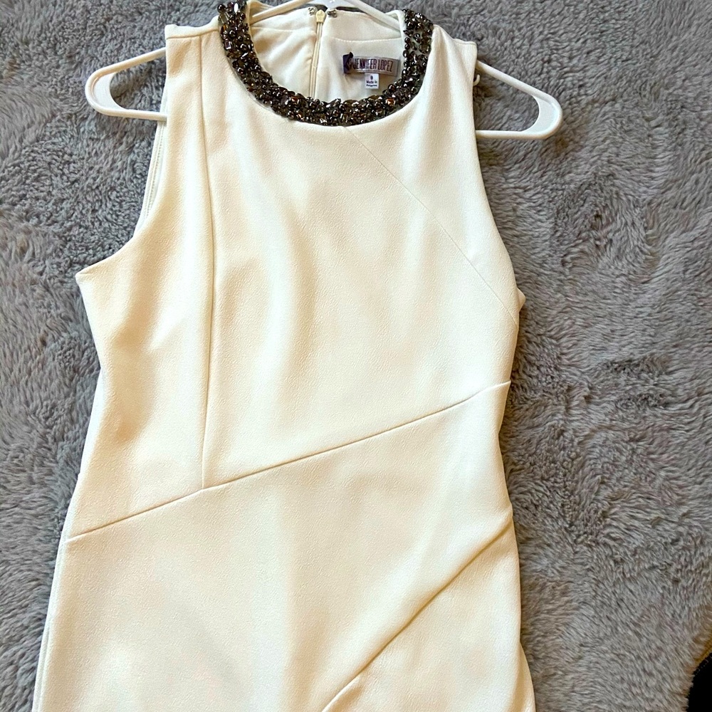 Jennifer Lopez Ivory, bodycon dress.